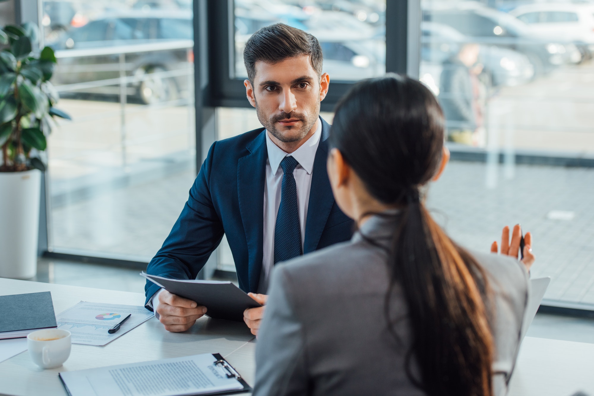 professional businesspeople talking on meeting in modern office